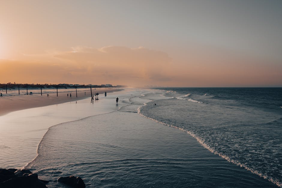 Beach Scenery - A peaceful sunset at a sandy beach with gentle w #12951940