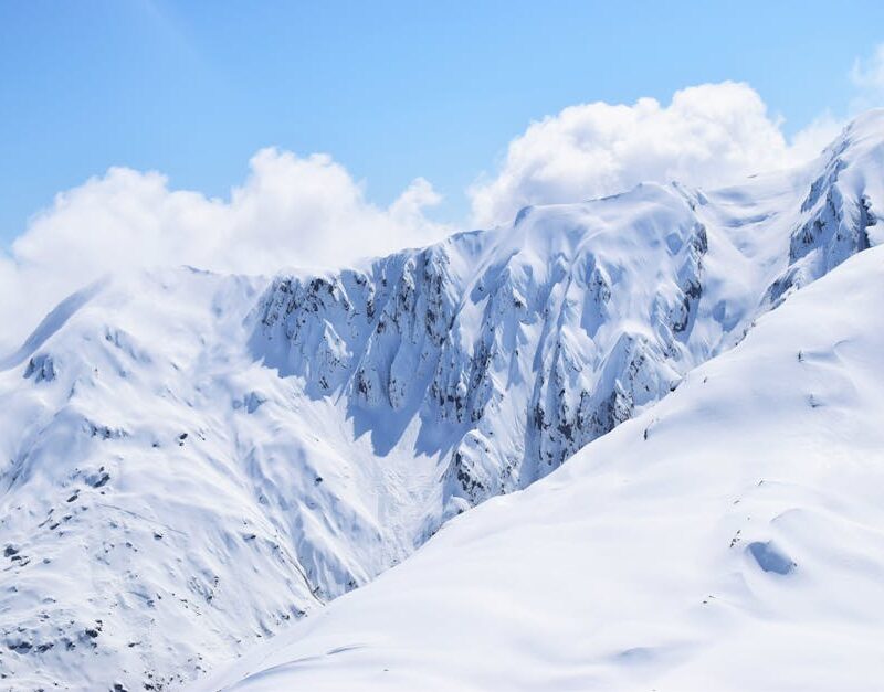Snow Mountains - Stunning snowy mountains under a bright blue sky #140234