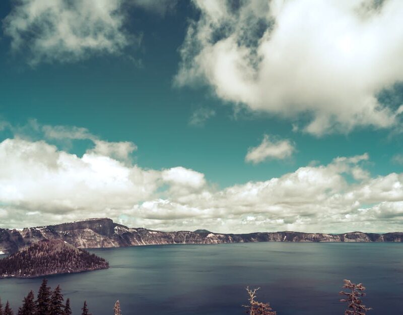 Lake Reflections - Breathtaking view of a serene mountain lake with #2599537