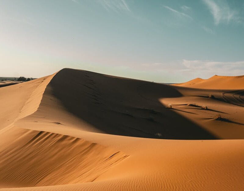 Desert Wilderness - Stunning view of sand dunes under a clear daytim #26775380