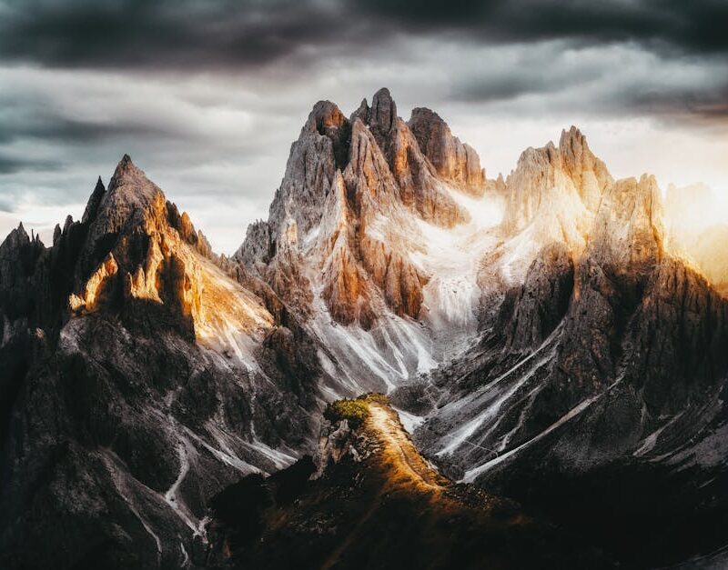 Mountain Landscapes - Captivating view of rugged mountain peaks illumi #28158788