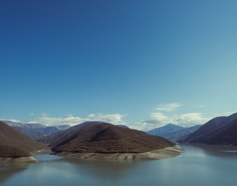 Lake Reflections - Peaceful landscape of Ananuri reservoir and moun #31895783