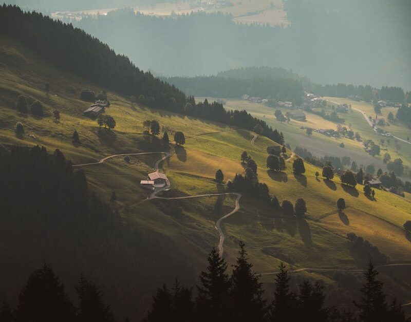 Mountain Landscapes - Early morning sunlight bathes the peaceful rolli #33771535