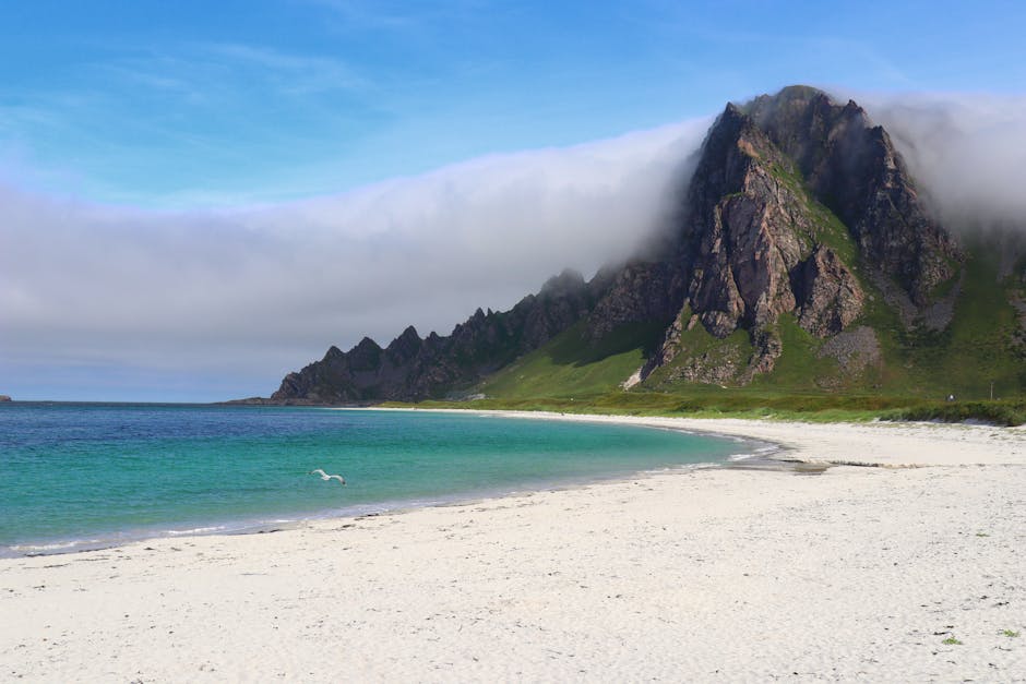 Beach Scenery - Explore the tranquil beach with towering mountai #34146948