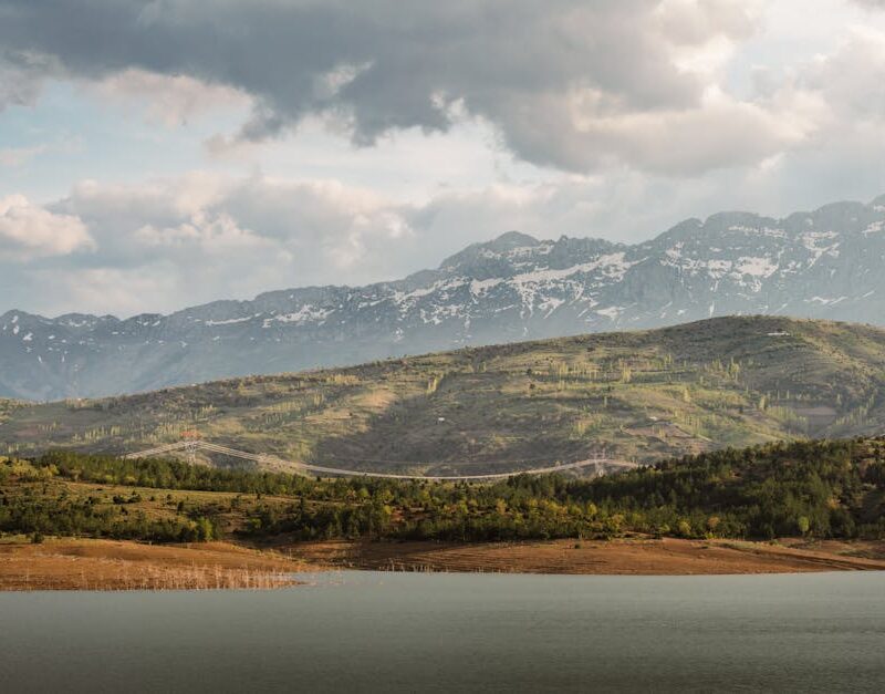 Lake Reflections - A breathtaking view of a mountain landscape with #34712155