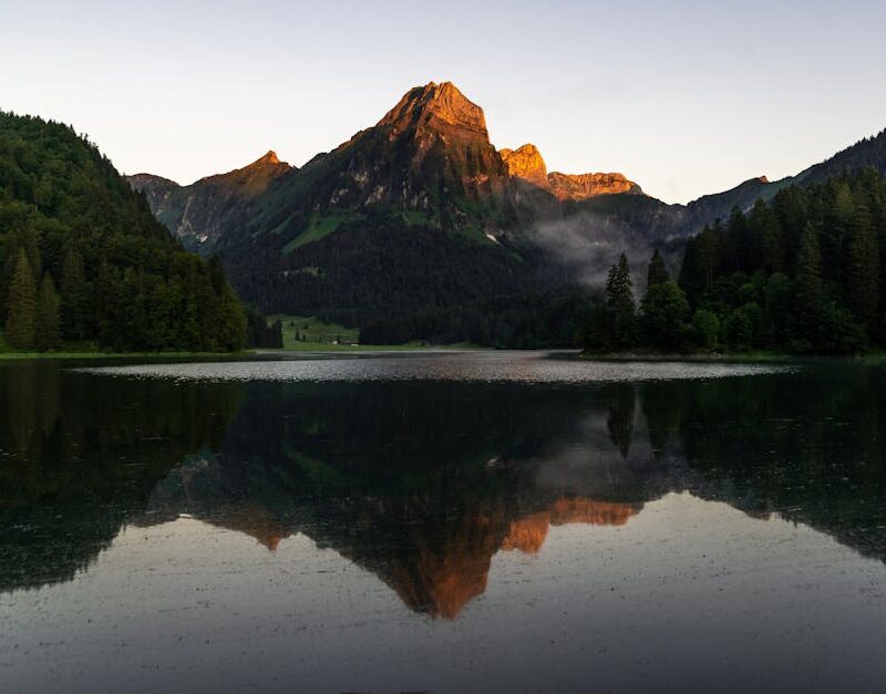 Lake Reflections - Stunning view of a mountain mirrored in a calm l #4800408