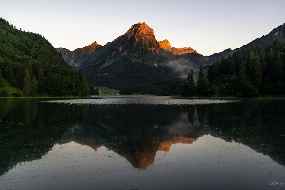 Lake Reflections - Stunning view of a mountain mirrored in a calm l #4800408