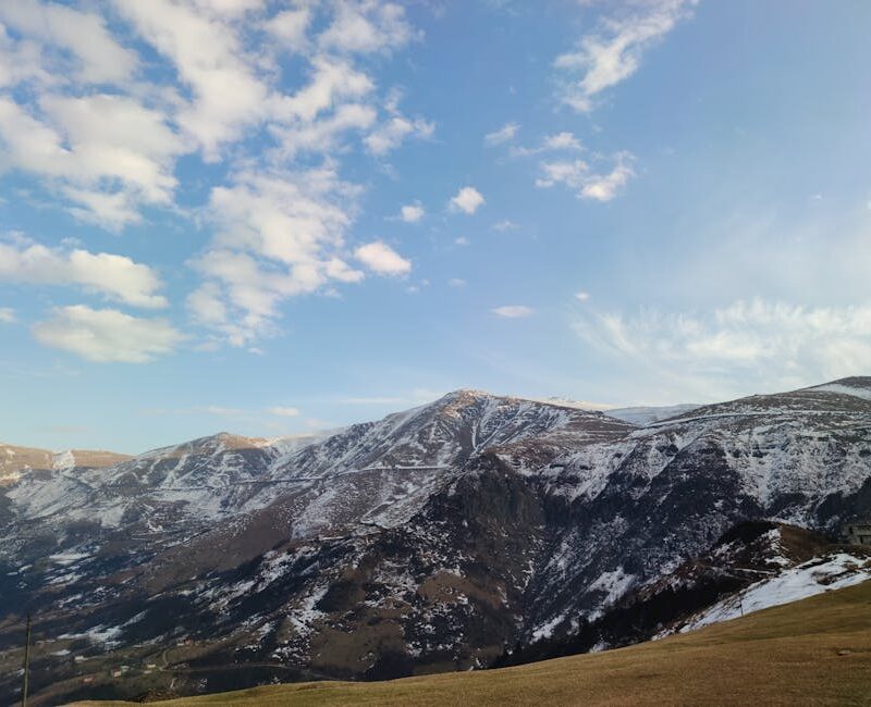 Mountain Landscapes - A breathtaking view of snow-capped mountains und #6396966